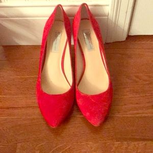 Red sueded heels